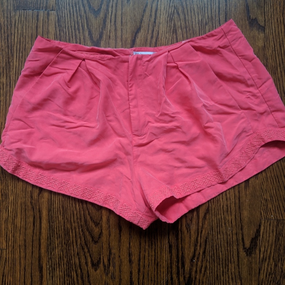 Pink pleated dress shorts